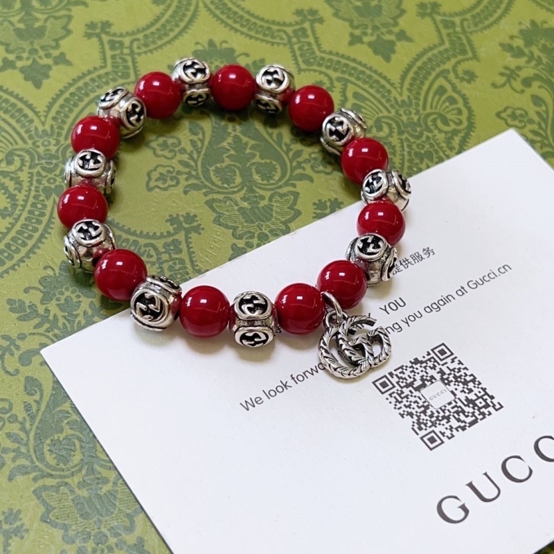 G*u*i bracelets